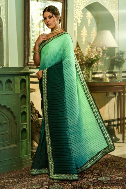 sari en mousseline de soie vert chinon avec miroir brodé