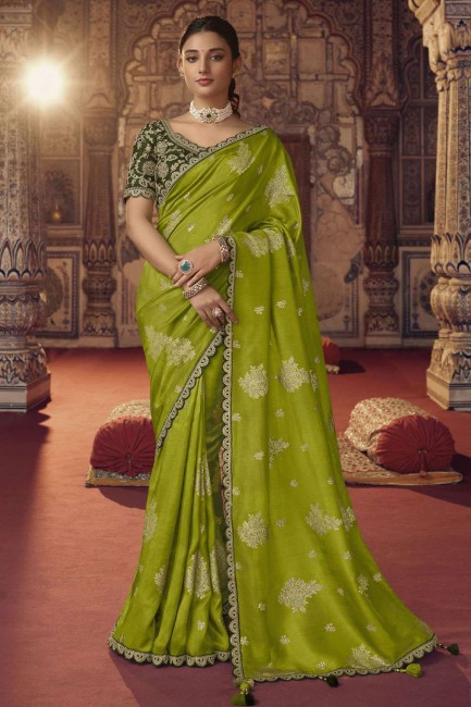 Resham, zari, viscose brodée perroquet vert sari avec chemisier