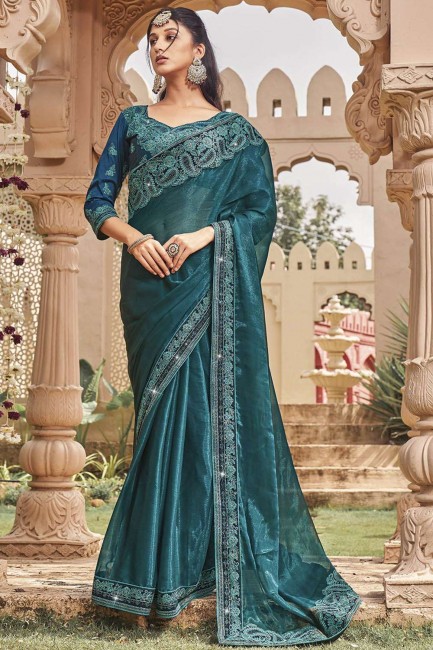 embroidered shimmer teal blue  sari with blouse