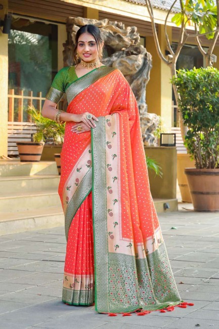 zari,thread,weaving banarasi silk sari in orange with blouse