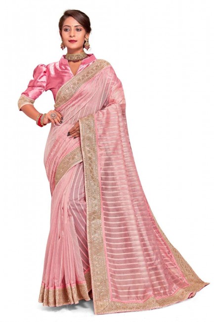 sari en tissu rose avec brodé