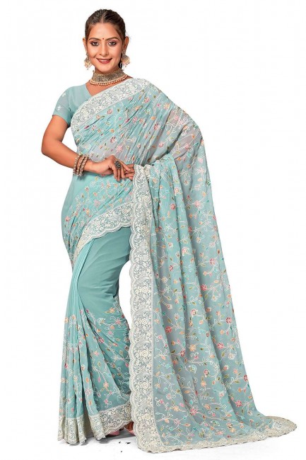 embroidered georgette sari in sea green  with blouse
