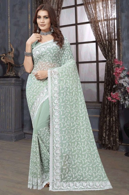 dusty pista  sari in georgette with embroidered