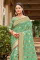 tissage de saris en coton vert et soie tissée à la main
