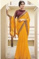 sari jaune en mousseline brodée avec chemisier