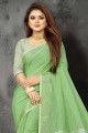 sari en lin vert clair avec bordure en dentelle
