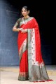 red zari,thread,weaving sari in banarasi silk