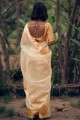 sari en organza doré avec tissage