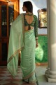sari de soie d'art en vert avec tissage, bordure en dentelle