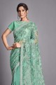 lycra aqua green sari in sequins,embroidered