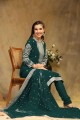 faux georgette rama green straight pant suit in embroidered